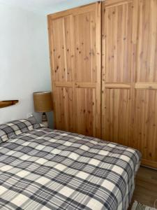 A bed or beds in a room at Il Giardino Nascosto - Bellagio, Lago di Como