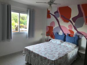 Katil atau katil-katil dalam bilik di Praia Castelhanos - ES