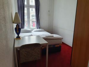 Ein Bett oder Betten in einem Zimmer der Unterkunft Märkischer Hof Hotel