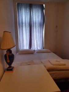 Ein Bett oder Betten in einem Zimmer der Unterkunft Märkischer Hof Hotel