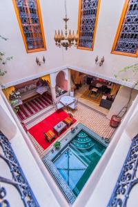 an overhead view of a house with a swimming pool at Riad Zahri in Marrakesh