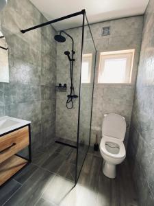 Ванная комната в Osada Jackowo
