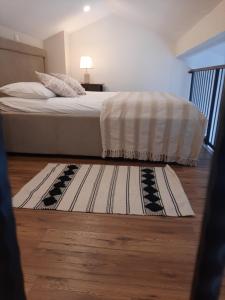 Postel nebo postele na pokoji v ubytování Apartments Emma