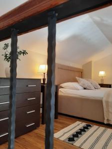 Postel nebo postele na pokoji v ubytování Apartments Emma
