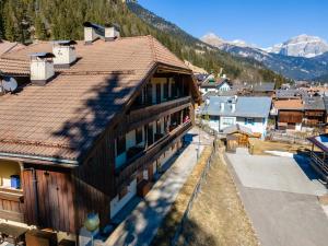 an overhead view of a building in a mountain town at Dimora Catitti in Mazzin