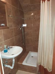 Koupelna v ubytování Hotel Hubert