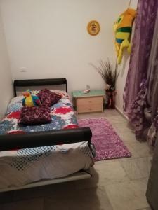 A bed or beds in a room at Casa Al Castello