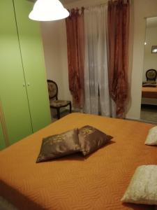 A bed or beds in a room at Casa Al Castello