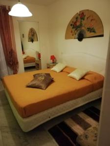 A bed or beds in a room at Casa Al Castello