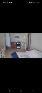 Kuchyň nebo kuchyňský kout v ubytování Apartmani Vesna