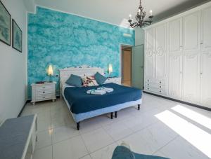 Lova arba lovos apgyvendinimo įstaigoje Giaella Sea View Apartment