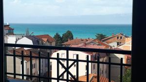a view of the ocean from a balcony at Deluxe Apartment Roland in Ohrid