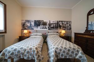 Postel nebo postele na pokoji v ubytování LA FONTANA FIORITA 2 + 19 fotografií