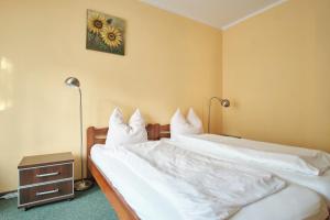 Postel nebo postele na pokoji v ubytování Willa Preludium