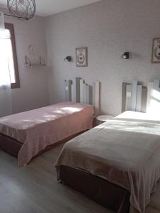 Katil atau katil-katil dalam bilik di le gite de margot