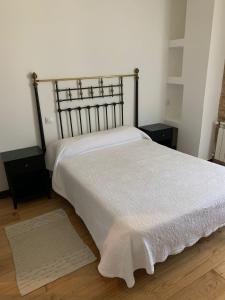 A bed or beds in a room at Casa Goris