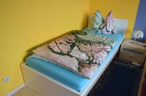 Ένα ή περισσότερα κρεβάτια σε δωμάτιο στο Gästehaus Maria