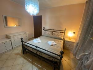 Postel nebo postele na pokoji v ubytování BELLA ASSISI B & B