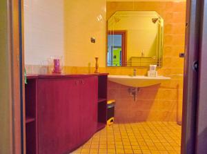 a bathroom with a sink and a mirror at B&B Maison Villa Vittorio in Avella +71 photos