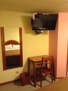 TV a/nebo společenská místnost v ubytování Royal Inn Hotel Juliaca