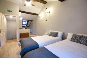 Cama ou camas em um quarto em Cuencaloft San Pedro 32