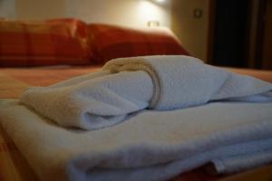 Postel nebo postele na pokoji v ubytování Hotel Iscla
