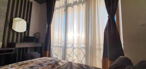 Postel nebo postele na pokoji v ubytování Apartment Sun - President Kop A512