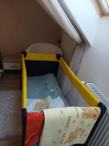 En eller flere senger på et rom på Sasvár Apartman