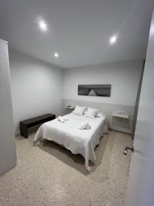 Postel nebo postele na pokoji v ubytování Apartamentos Ortega