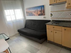 Kuchyň nebo kuchyňský kout v ubytování Apartamentos Ortega