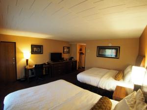 Cama o camas de una habitación en Evergreen Resort