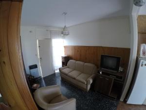 Een zitgedeelte bij Departamento 2 habitaciones en Alta Gracia - Córdoba