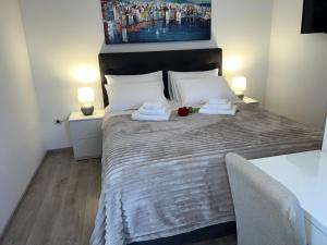 Postel nebo postele na pokoji v ubytování Rooms Marija