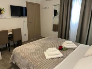 Postel nebo postele na pokoji v ubytování Rooms Marija