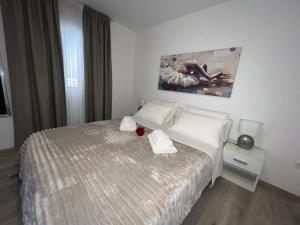 Postel nebo postele na pokoji v ubytování Rooms Marija