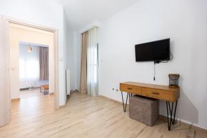 TV a/nebo společenská místnost v ubytování Casa Villa, Xenia Paliouri