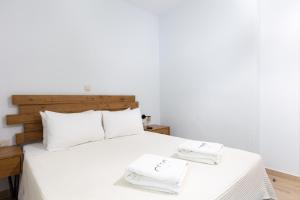 Postel nebo postele na pokoji v ubytování Casa Villa, Xenia Paliouri