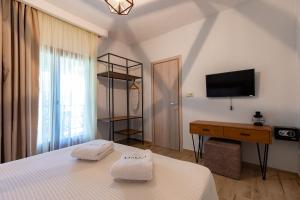 Postel nebo postele na pokoji v ubytování Casa Villa, Xenia Paliouri + 37 fotografií