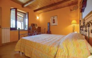 Postel nebo postele na pokoji v ubytování La villa del Madrigale