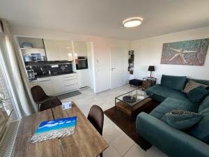Kuchyň nebo kuchyňský kout v ubytování Ferienwohnung in Dornumersiel an der Nordsee