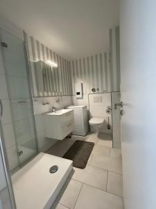 Koupelna v ubytování Ferienwohnung in Dornumersiel an der Nordsee
