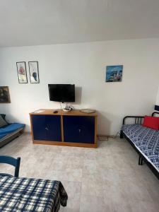 TV/trung tâm giải trí tại Vittoria Paradise it Castelsardo Sardegna