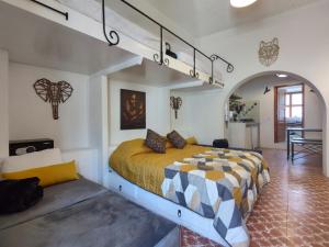 Ein Bett oder Betten in einem Zimmer der Unterkunft Terrazas de la Alameda - Panoramic Aparthotel by Lunian