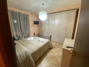 Postel nebo postele na pokoji v ubytování BELLA ASSISI B & B