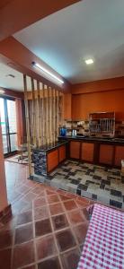 Kuchyň nebo kuchyňský kout v ubytování Looniva Guest House