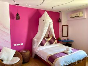 Katil atau katil-katil dalam bilik di Hana B&B