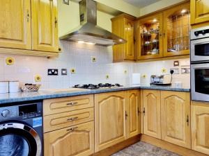 Inverness City 3 bedroom house tesisinde mutfak veya mini mutfak