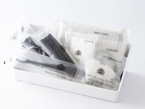 a package of four toothbrushes in a plastic container at APA Hotel & Resort Yokohama Bay Tower in Yokohama