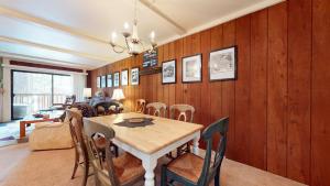 a dining room with a table and chairs at Summit 45 Apartment in Mammoth Lakes