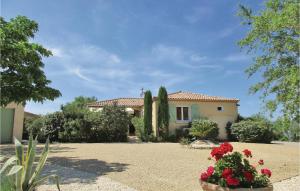 a house with some flowers in front of it at Amazing Home In Cruzy in Cruzy +30 photos